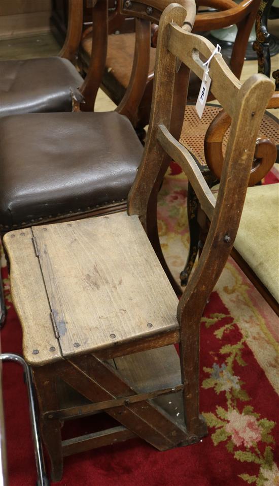 An early 20th century French metamorphic library chair